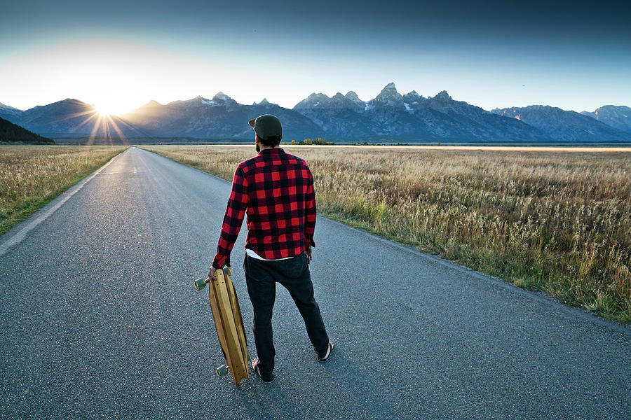 Adult Photograph - A Skateboarder Watching The Sun Set by Rob Hammer Adult Photograph - A Skateboarder Watching The Sun Set by Rob Hammer