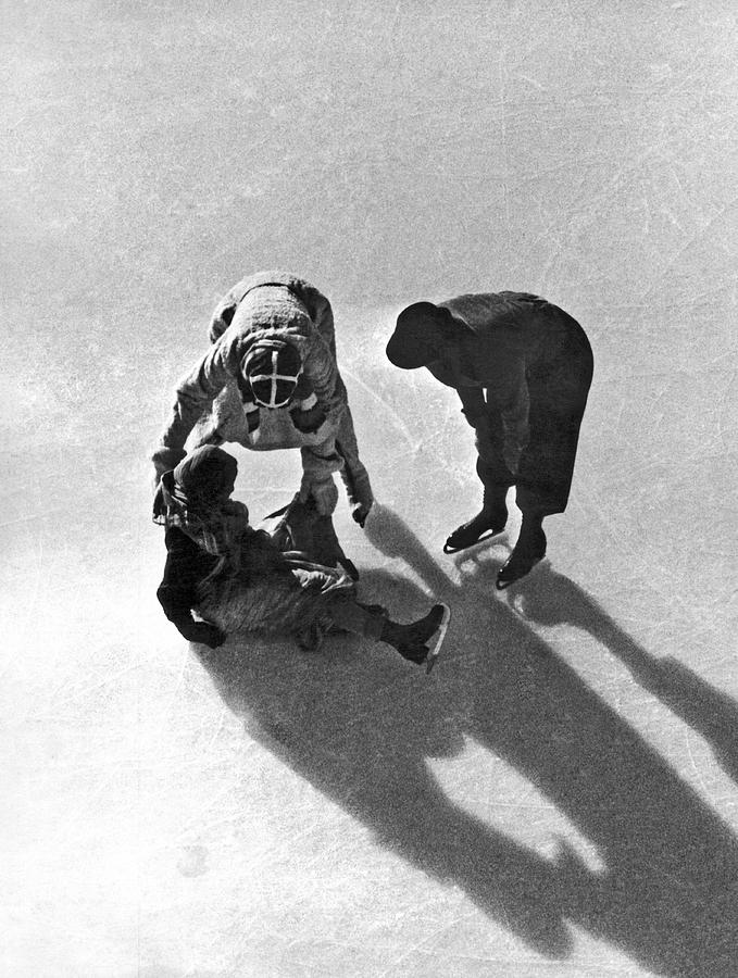 A Skater Gets Help From A Friend Photograph by Underwood Archives