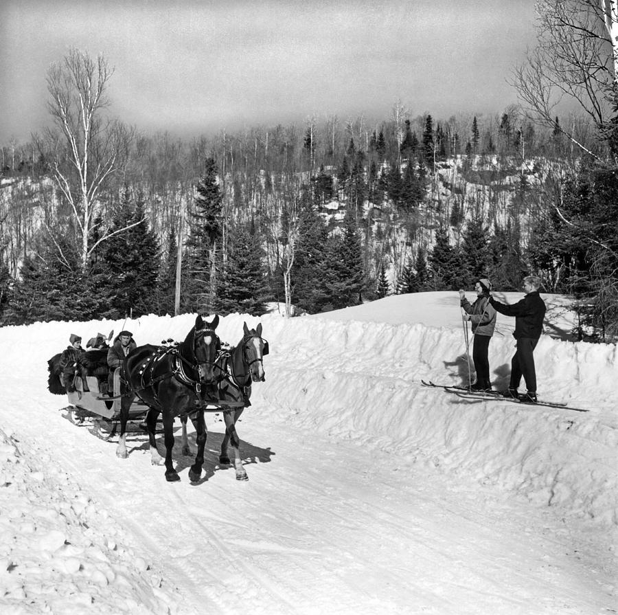 A Sleigh Ride Greets Skiers Photograph by Underwood Archives - Fine Art ...