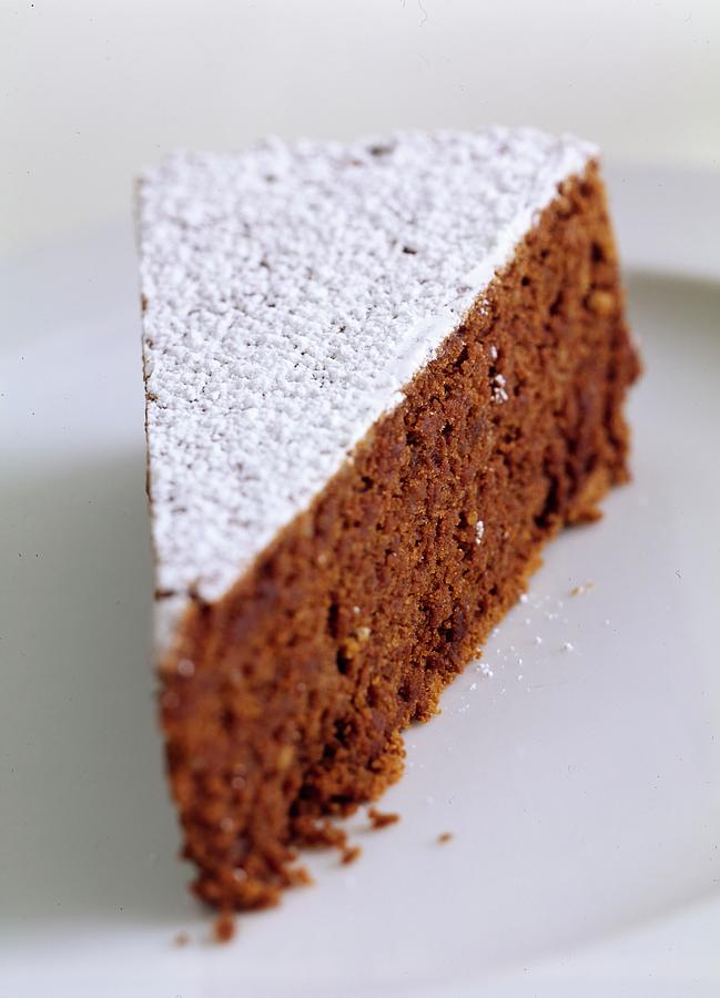 A Slice Of Chocolate Raspberry Ganache Cake Photograph by Romulo Yanes