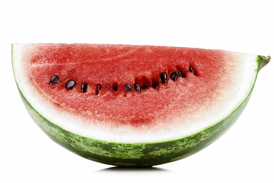 A slice of fresh red watermelon Photograph by Creative Crop