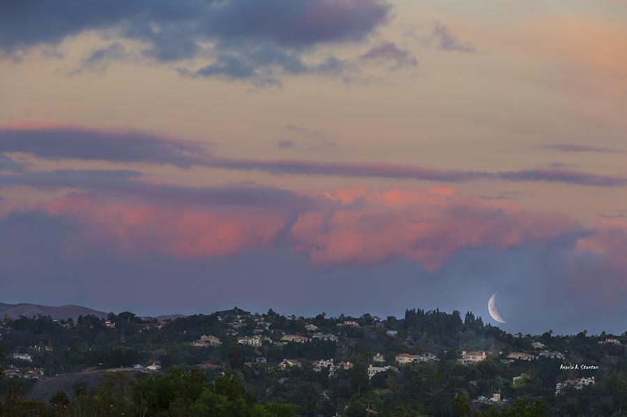 A Sliver Of A Moon With Dramatic Pink Clouds Photograph