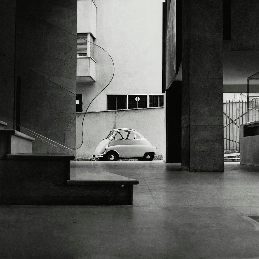 A Small Parked Car Photograph by Paul Himmel