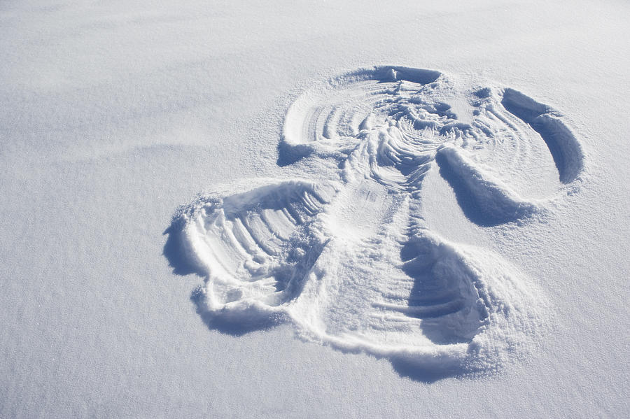 A snow angel Photograph by OJO Images