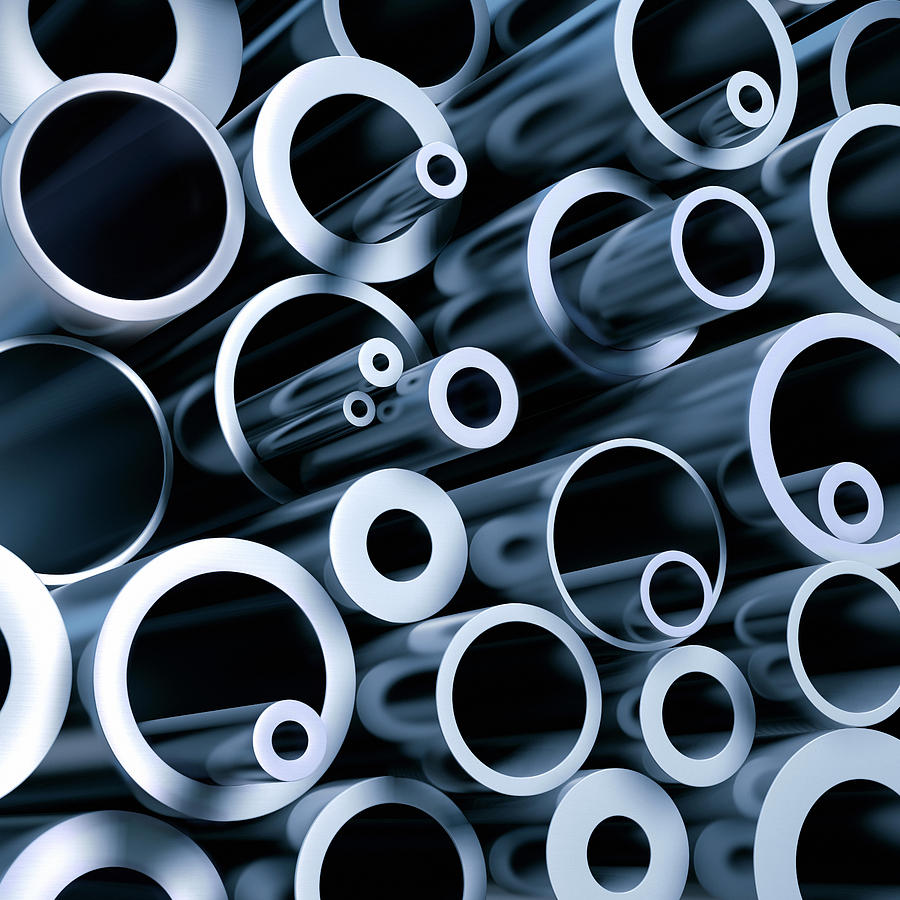 A stack of various metall pipes Photograph by Artpartner-images