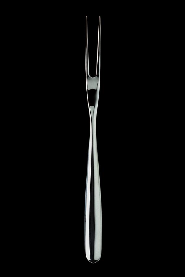 A Stainless Steel Fork Photograph by Romulo Yanes