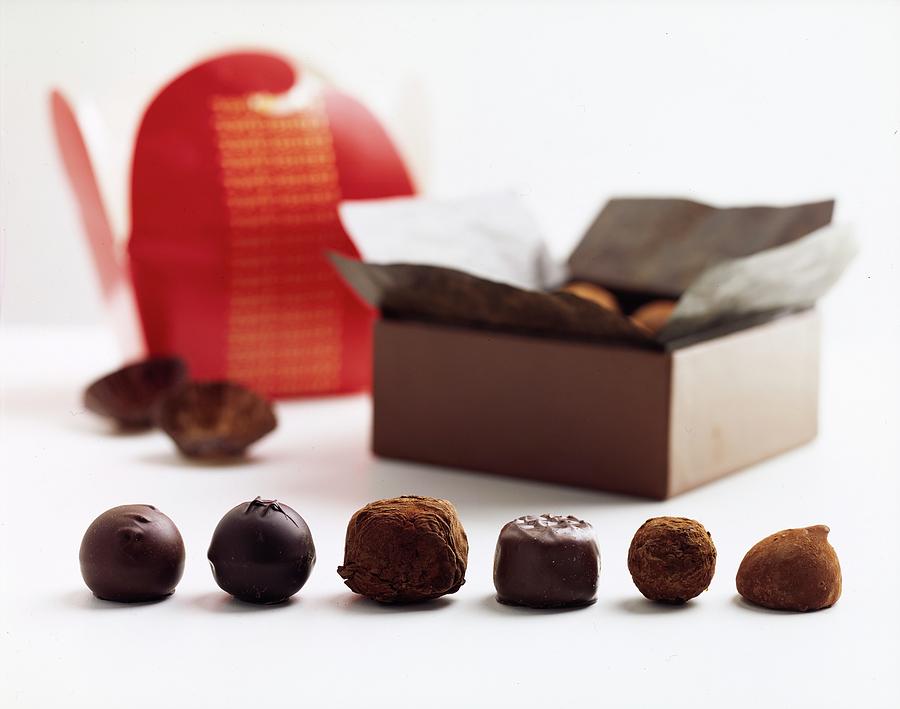 A Still Life Photo Of Gourmet Chocolates Photograph by Romulo Yanes