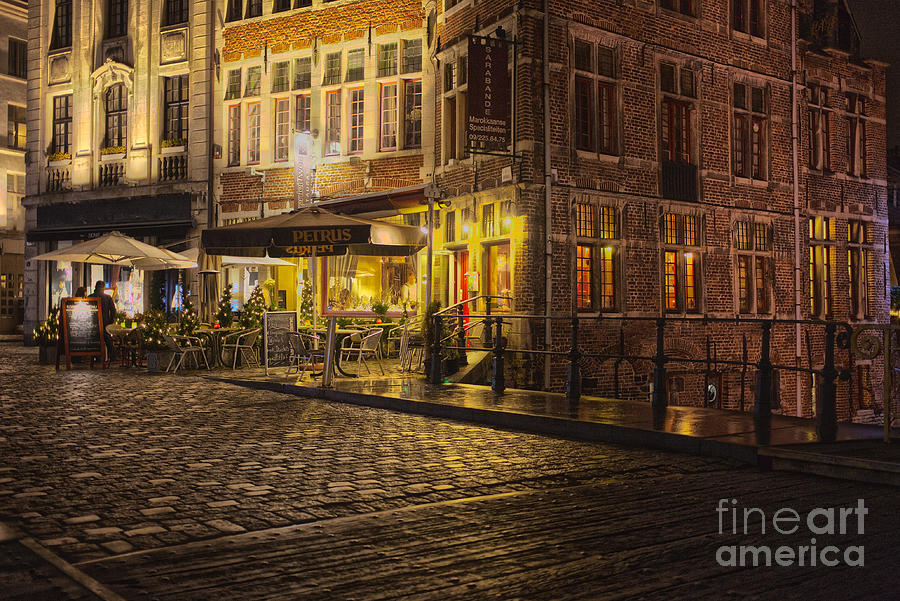 A streetscene at night in Europe Photograph by Patricia Hofmeester