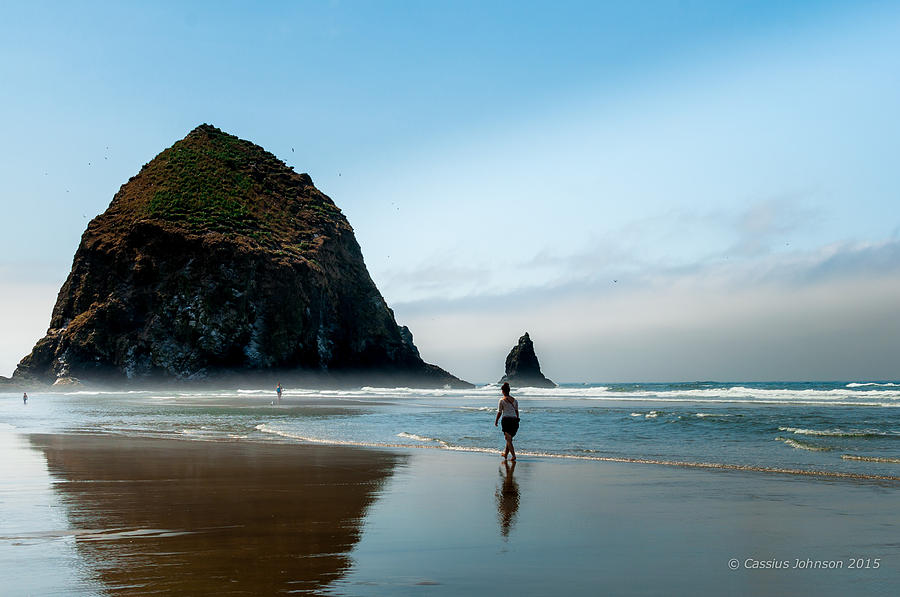A Stroll At Cannon Beach Oregon Photograph by Cassius Johnson