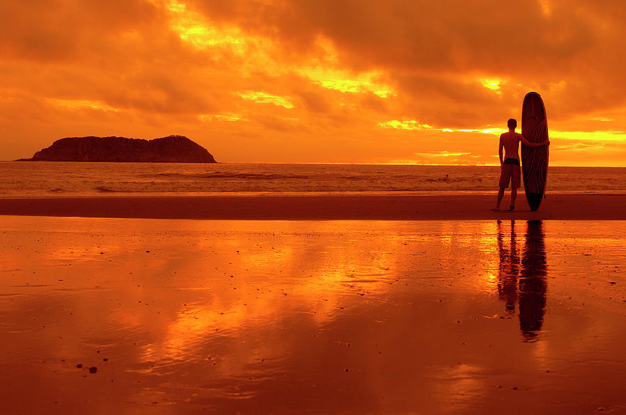 Sunset Photograph - A Surfer Takes A Moment To Enjoy by Lucas Gilman