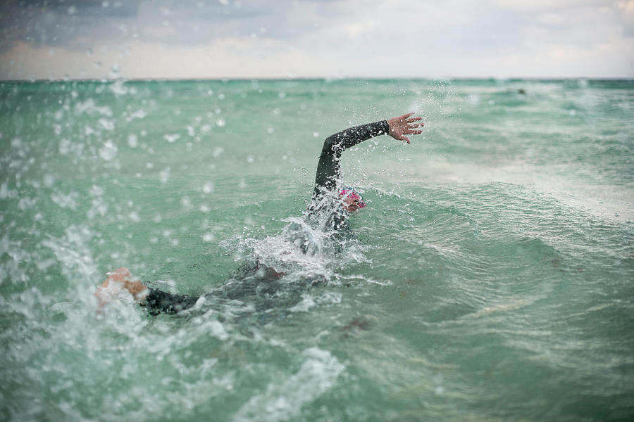 A Swimmer In The Ocean In Tulum, Mexico Photograph by Marcos Ferro ...