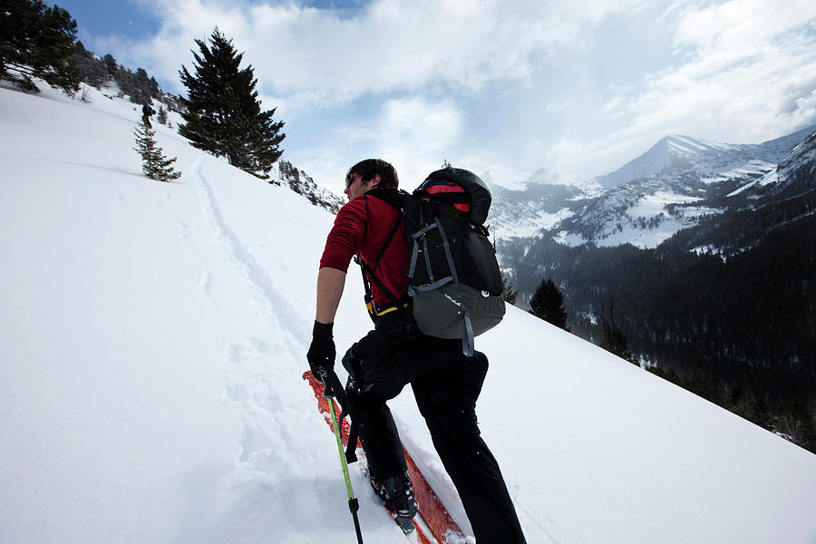 A Telemark Skier Skins Up A Mountain Photograph by Patrick Orton Fine