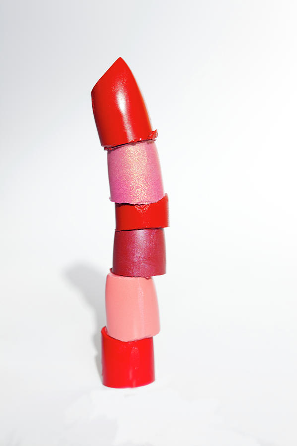 A Tower Of Lip-stick Tips On White Photograph by Reggie Casagrande