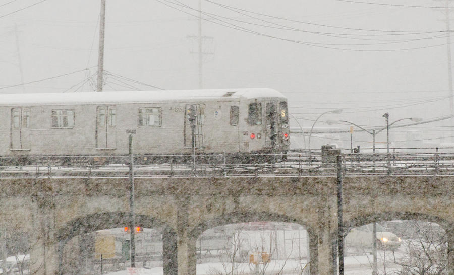 A Train Shuttle in Snowstorm Photograph by Maureen E Ritter