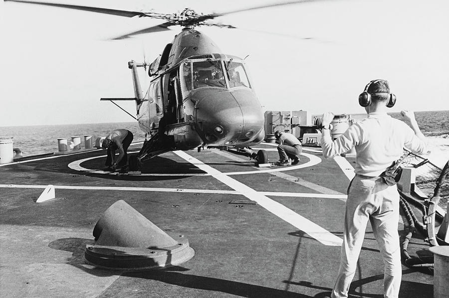 A Uh-2 Seasprite Helicopter Lands Photograph