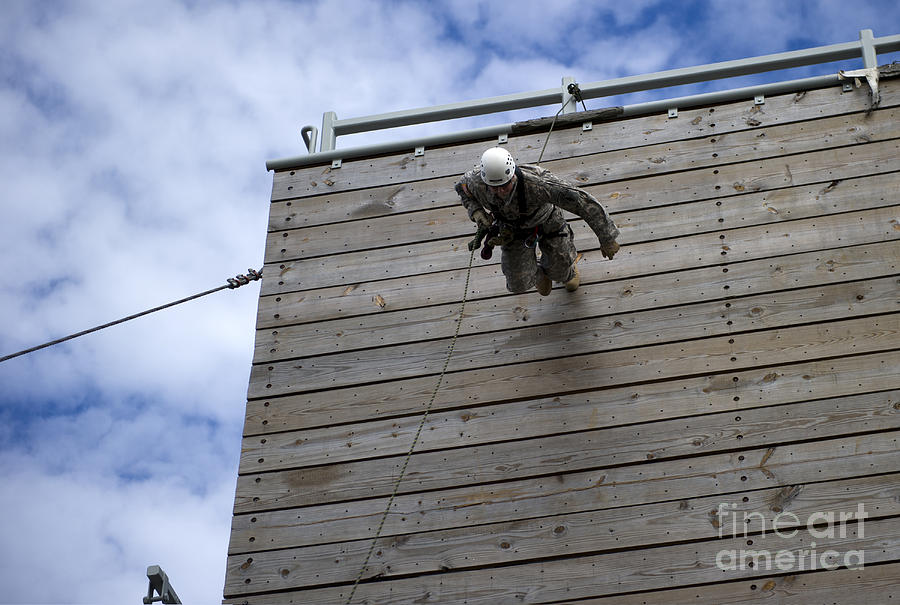 Rope Photograph - A U.s. Soldier Runs Down A 40-foot by Stocktrek Images