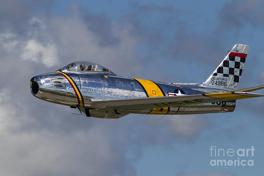 Transportation Photograph - A Vintage F-86 Sabre Of The Warbird by Rob Edgcumbe