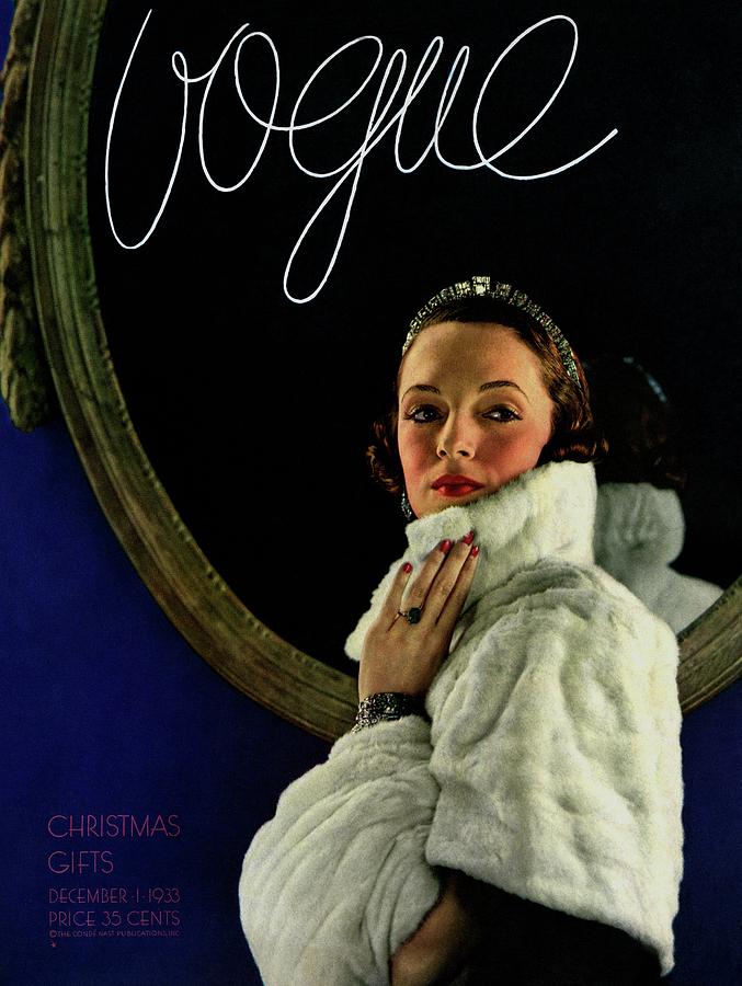 A Vogue Cover Of A Model Wearing A Cape And Muff Photograph by Edward Steichen