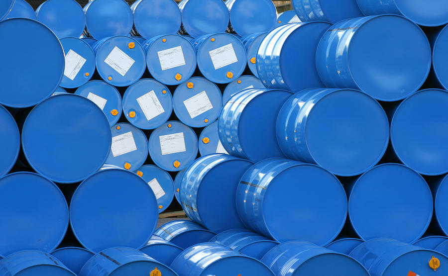 A warehouse full of blue Hugh barrels  Photograph by The-Tor