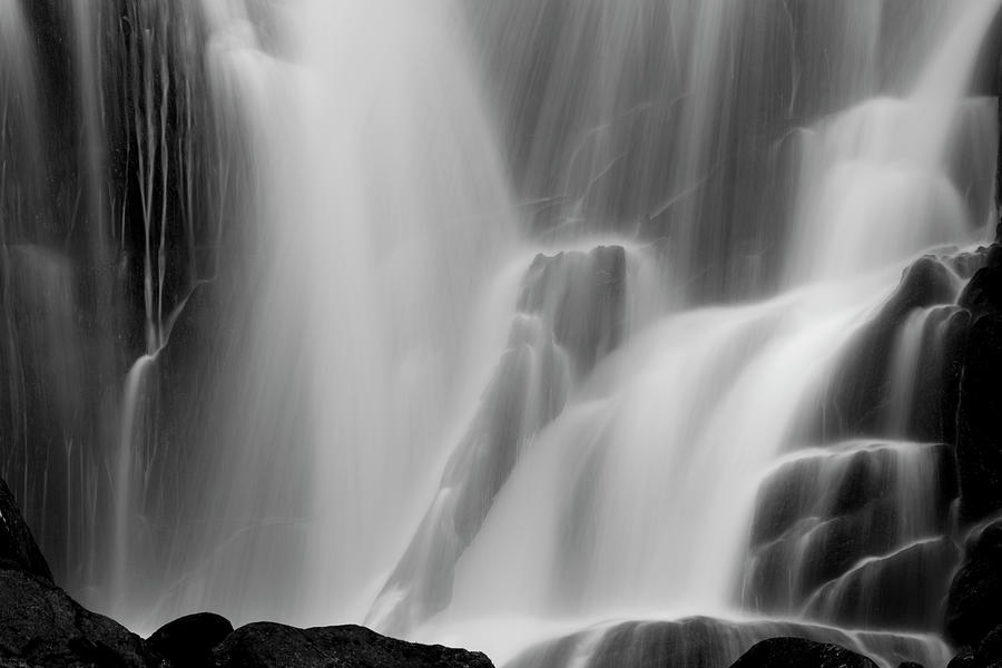 A Waterfall Flowing Down A Cliff Face Photograph by Mint Images - Art Wolfe