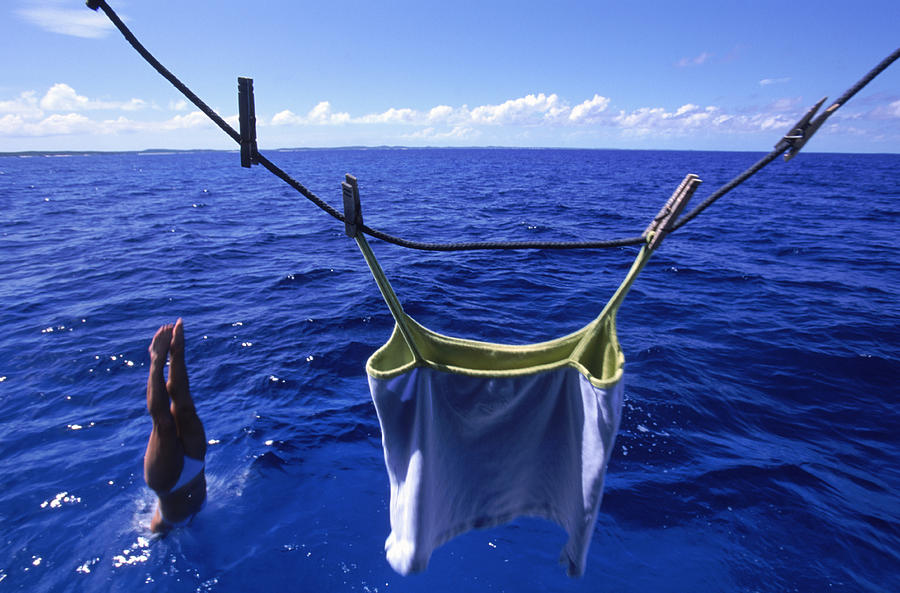 A Woman Dives Straight Into The Sea Photograph by David McLain A Woman Dives Straight Into The Sea Photograph by David McLain