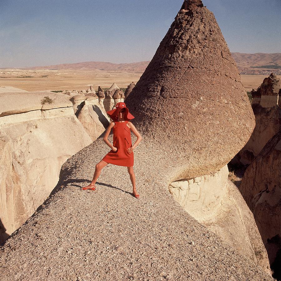 A Woman Modeling A Red Dress In Goreme Photograph by Henry Clarke