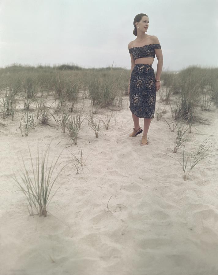 A Woman On A Beach Wearing An Off-the-shoulder Photograph by Serge Balkin