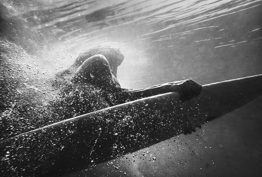 Daredevil Photograph - A Woman On A Surfboard Under The Water by Ben Welsh