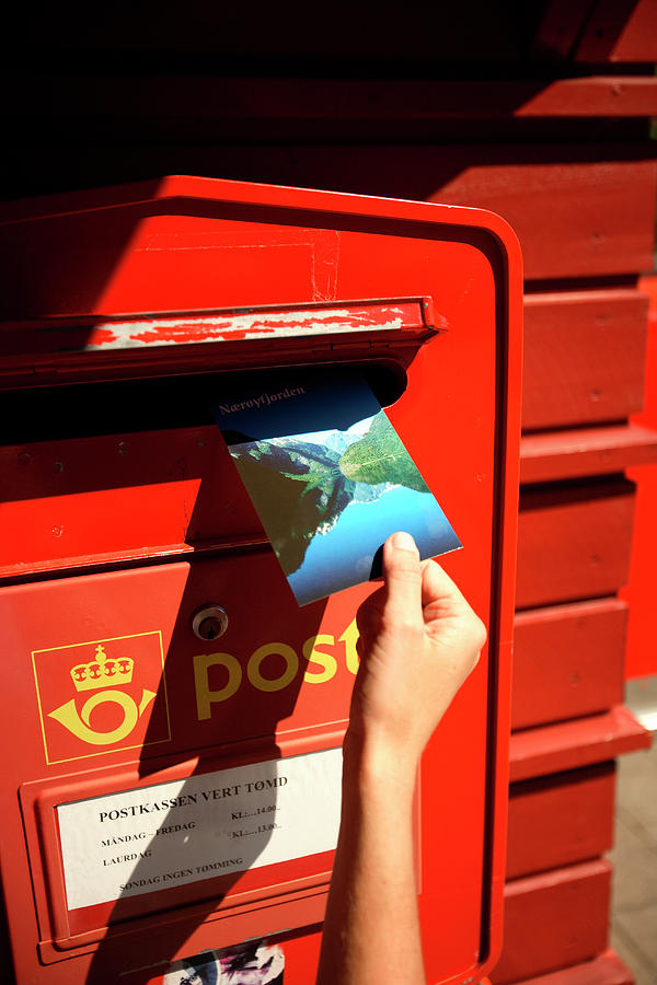 Mountain Photograph - A Woman Puts A Postcard Into A Red Mail by R&d Foto
