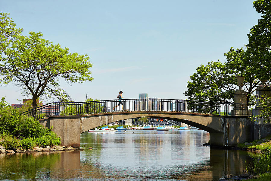 A Woman Runs Along The Esplanade Photograph by Josh Campbell A Woman Runs Along The Esplanade Photograph by Josh Campbell