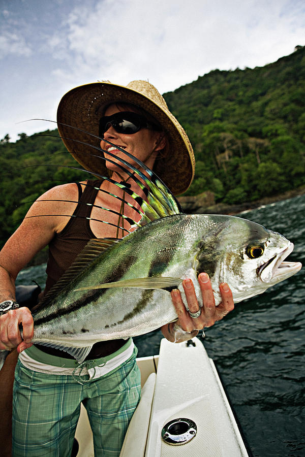A Women Fishing In Sunglasses And Straw Photograph by Chris Ross - Pixels