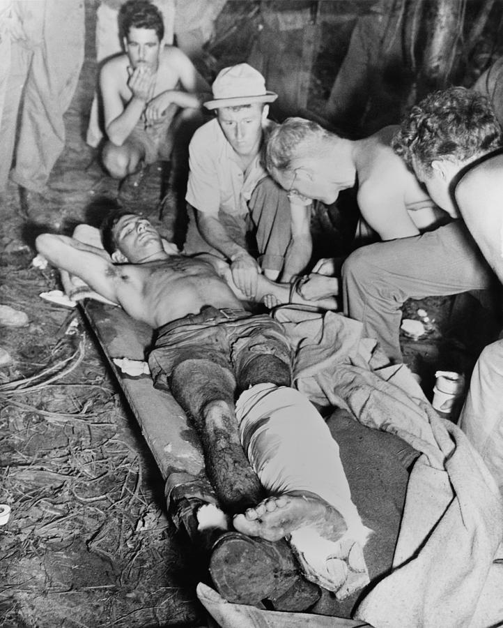 A Wounded American Soldier Gets A Blood Photograph by Everett