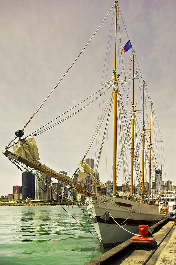 A yacht moored at Navy Pier Photograph by Ray Devlin