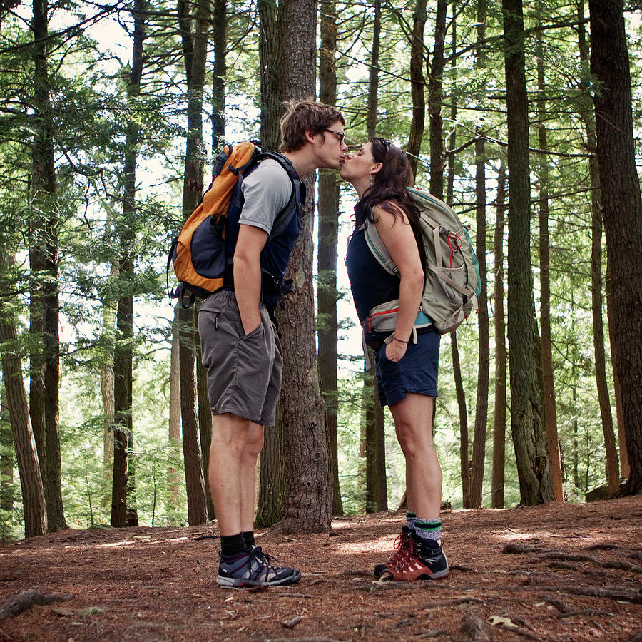 A Young Couple Kisses While Hiking Photograph by Chris Bennett - Pixels