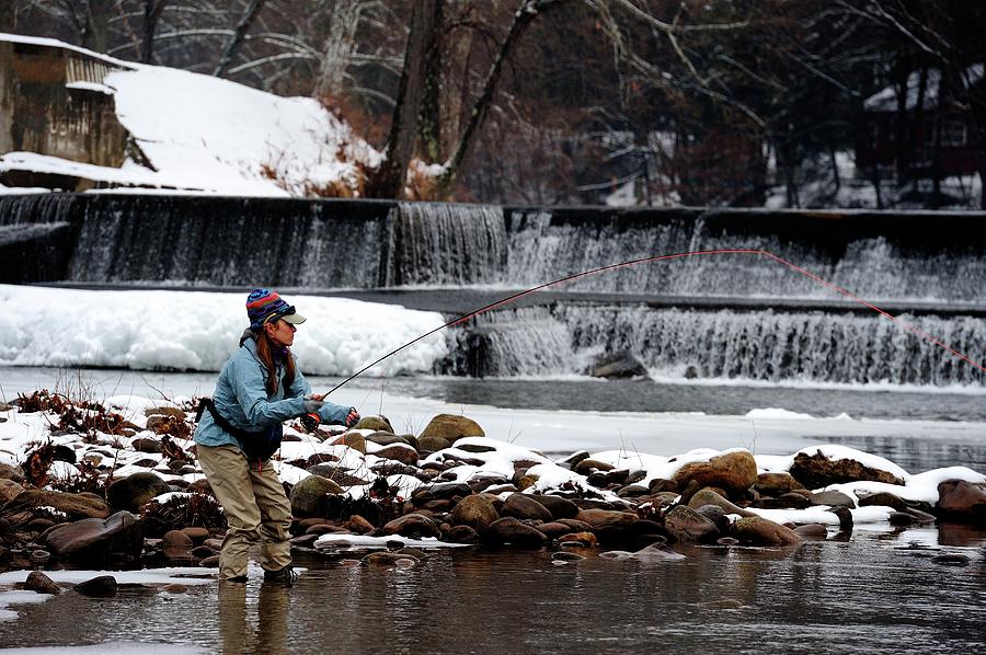 A Young Lady Fly Fishing On A Cold Photograph by Beck Photography ...