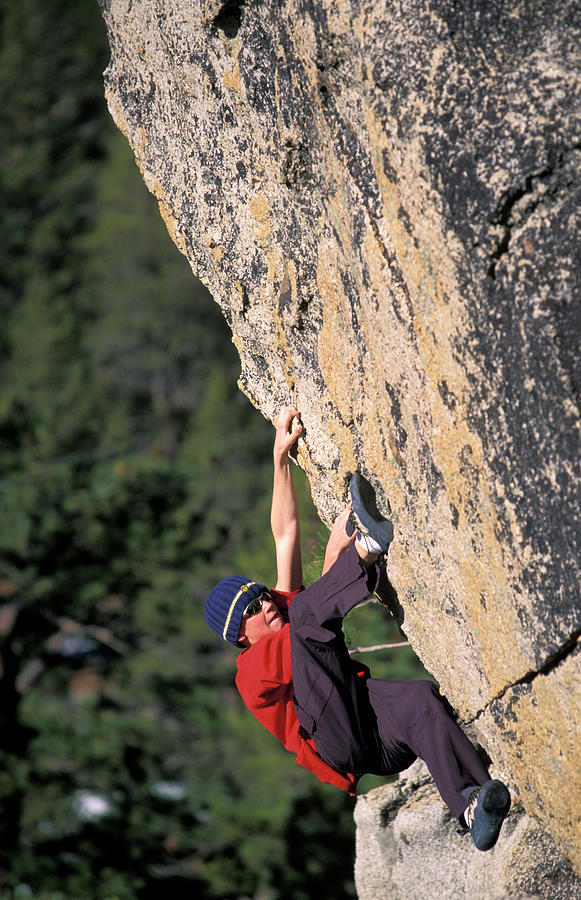 A Young Male Rock Climber Bouldering Photograph By Corey Rich Fine Art America