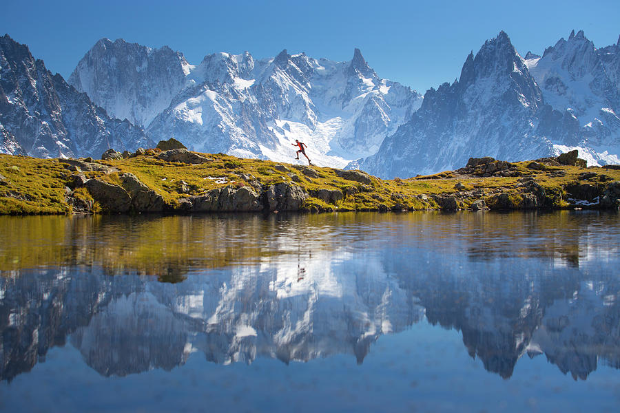 A Young Male Runner Is Sprinting Photograph by Menno Boermans - Fine ...