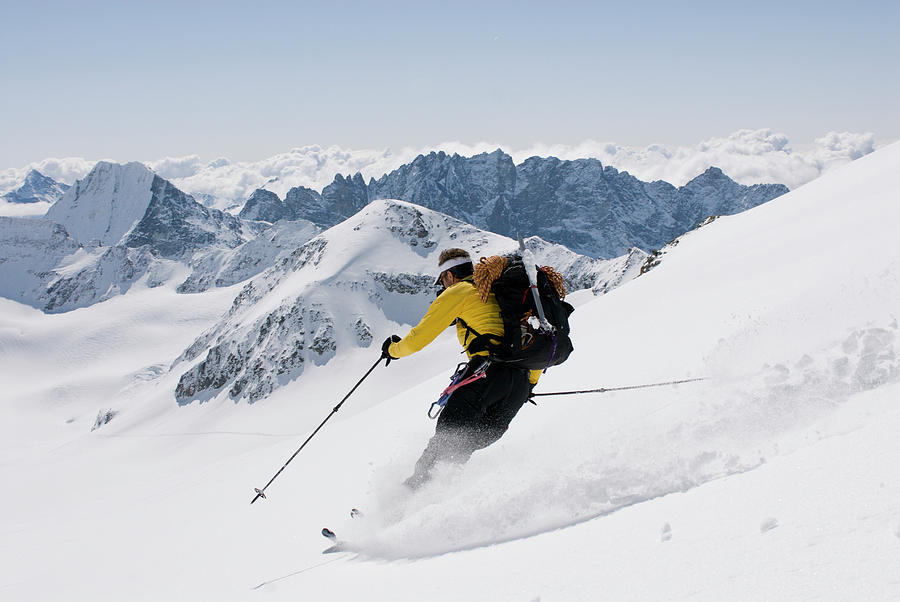 A Young Man Skis The Glacier Du Mont Photograph by Jeff Diener - Pixels