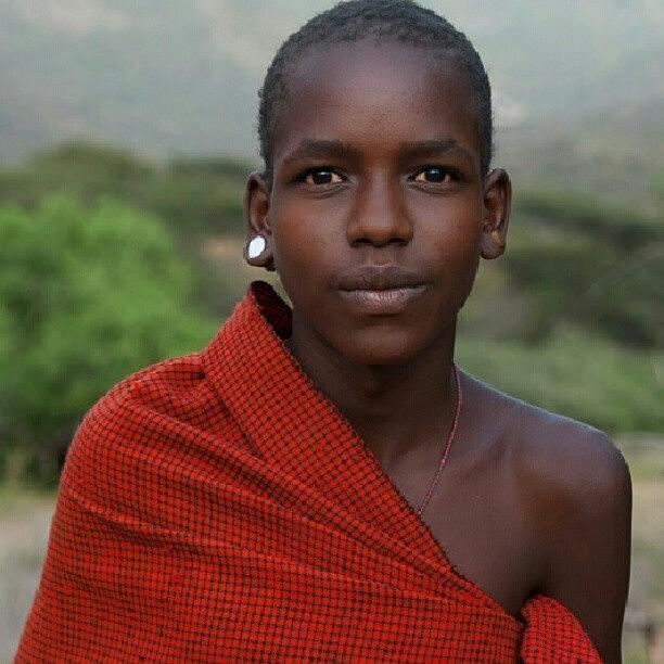 Portrait Photograph - A Young Samburu Warrior In A Typical by Grant Swanepoel