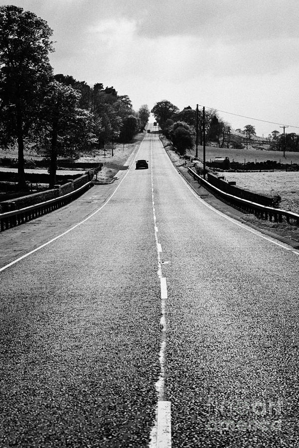 Road Photograph - A69 Road On The Border Of Cumbria And Northumberland Uk by Joe Fox