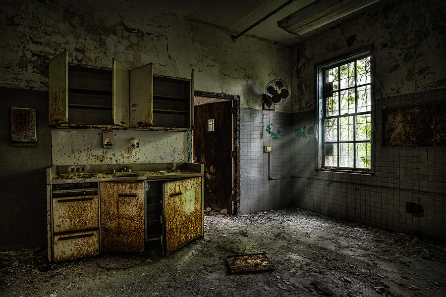 Spooky Places Photograph - Abandoned building - Old asylum - Open cabinet doors by Gary Heller