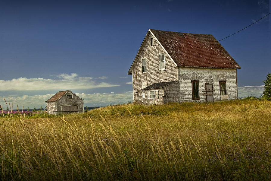 Abandoned buildings along the coast on Prince Edwards Island Photograph by Randall Nyhof