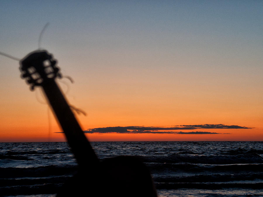 Acoustic guitar on the beach Photograph by Mike Santis