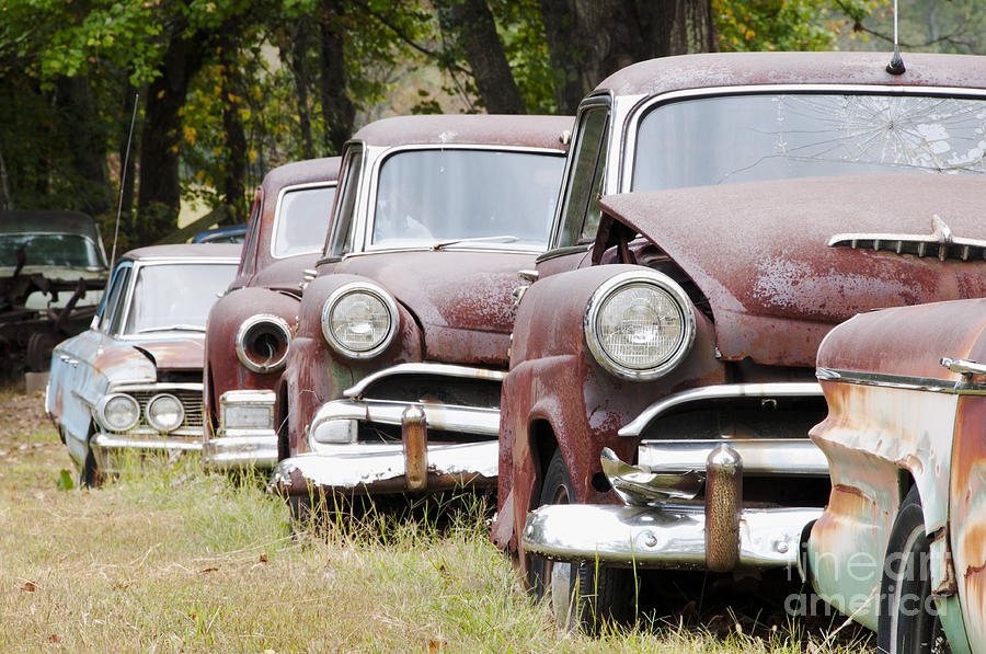 Abandoned rusted cars Photograph by Oscar Gutierrez