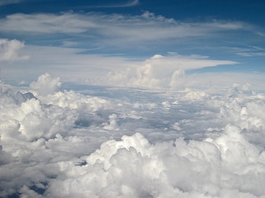 Above The Clouds Over Texas image a Photograph by Byron Varvarigos