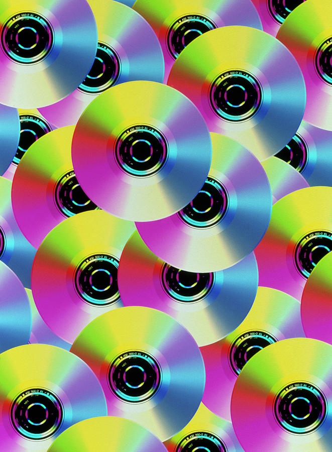Abstract Computer Art Of Compact Disks Photograph by Mehau Kulyk/science Photo Library