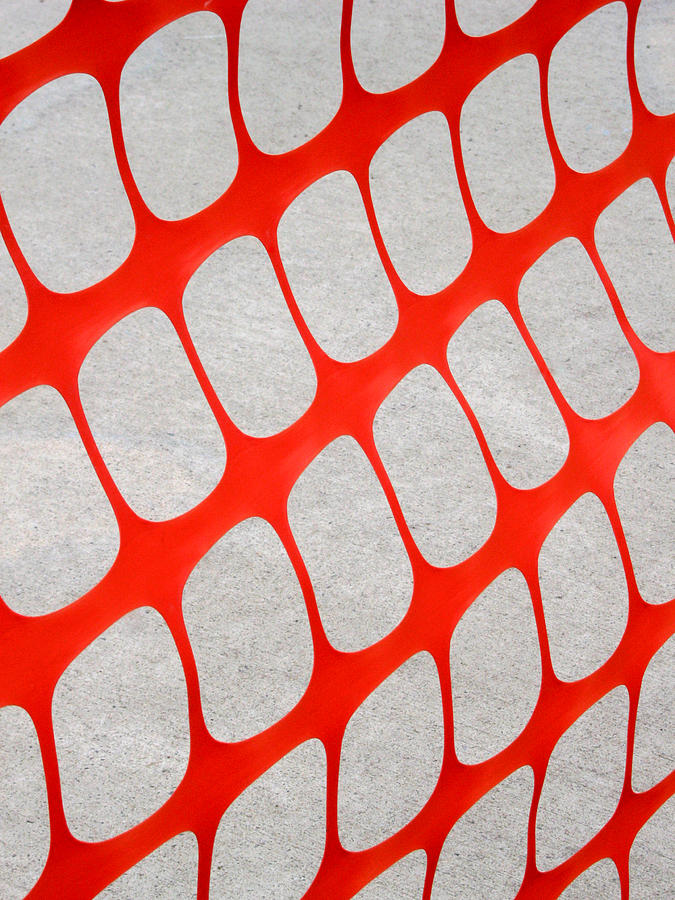 Abstract image of an orange snow fence pattern. Photograph by Rob Huntley