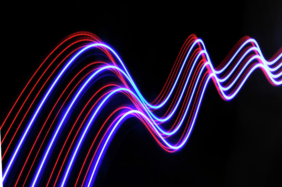 Abstract Photograph - Abstract Light Trails And Streams by John Rensten