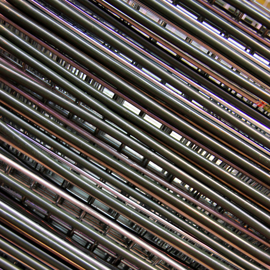 Abstract View Of Shopping Baskets Photograph by Andrea Kennard Photography
