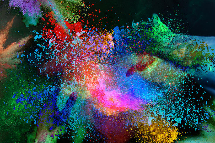 Abstract view with inverted colors of the colorful Holi celebration with powder splash. Photograph by Artur Debat